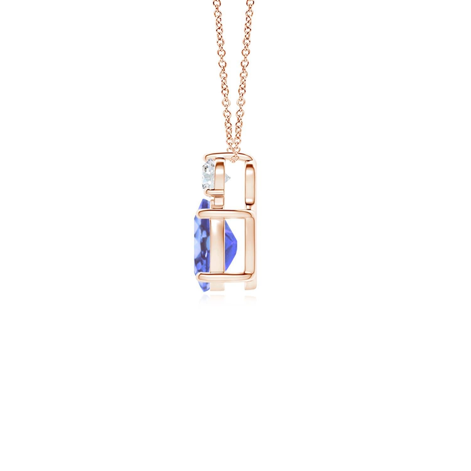 An oval tanzanite is topped with a glimmering round diamond, both held in prong settings. The alluring bluish-violet hue of the tanzanite is elevated by the diamond's unending sparkle. To add a dash of exquisiteness, this classic solitaire tanzanite