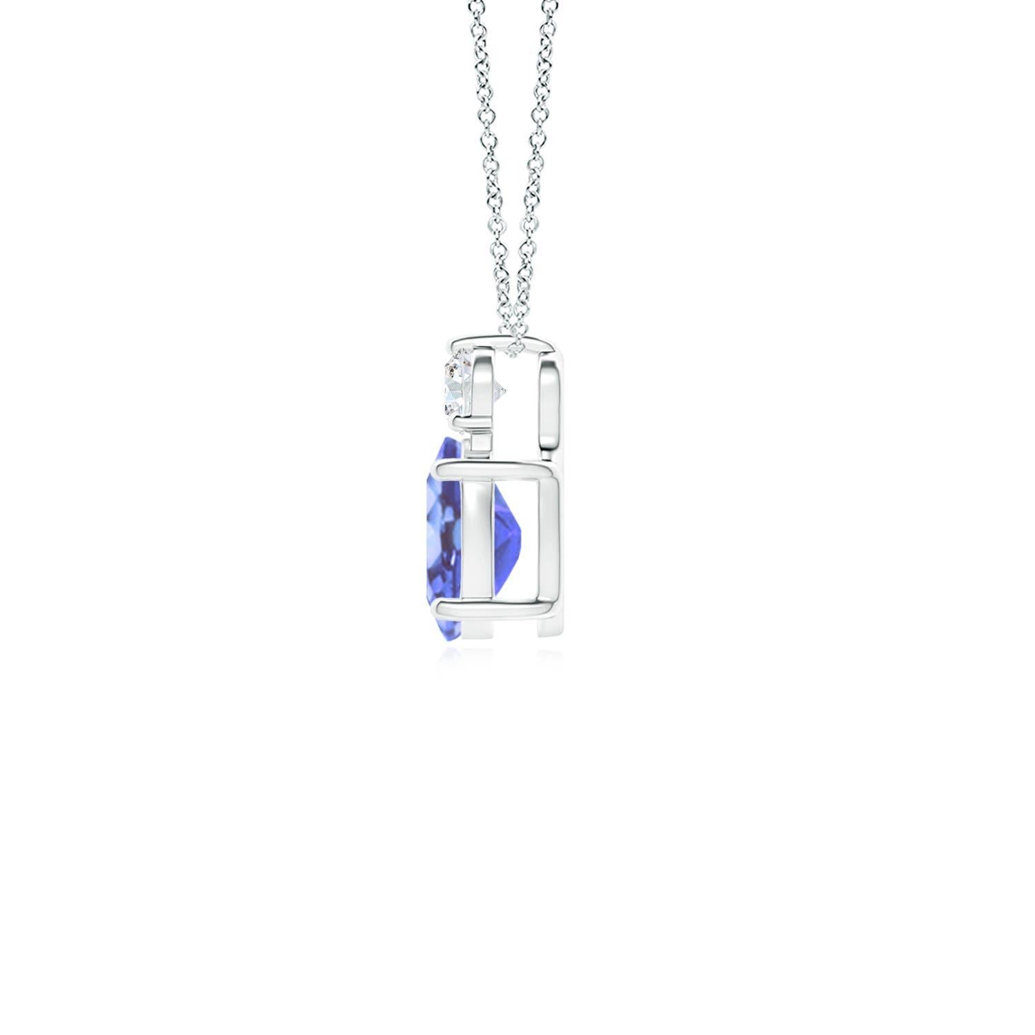 An oval tanzanite is topped with a glimmering round diamond, both held in prong settings. The alluring bluish-violet hue of the tanzanite is elevated by the diamond's unending sparkle. To add a dash of exquisiteness, this classic solitaire tanzanite