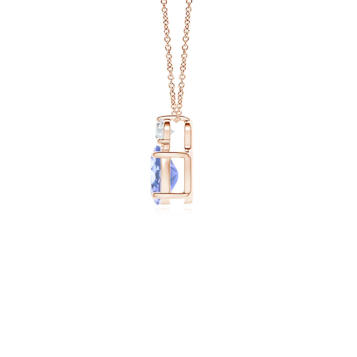 An oval tanzanite is topped with a glimmering round diamond, both held in prong settings. The alluring bluish-violet hue of the tanzanite is elevated by the diamond's unending sparkle. To add a dash of exquisiteness, this classic solitaire tanzanite