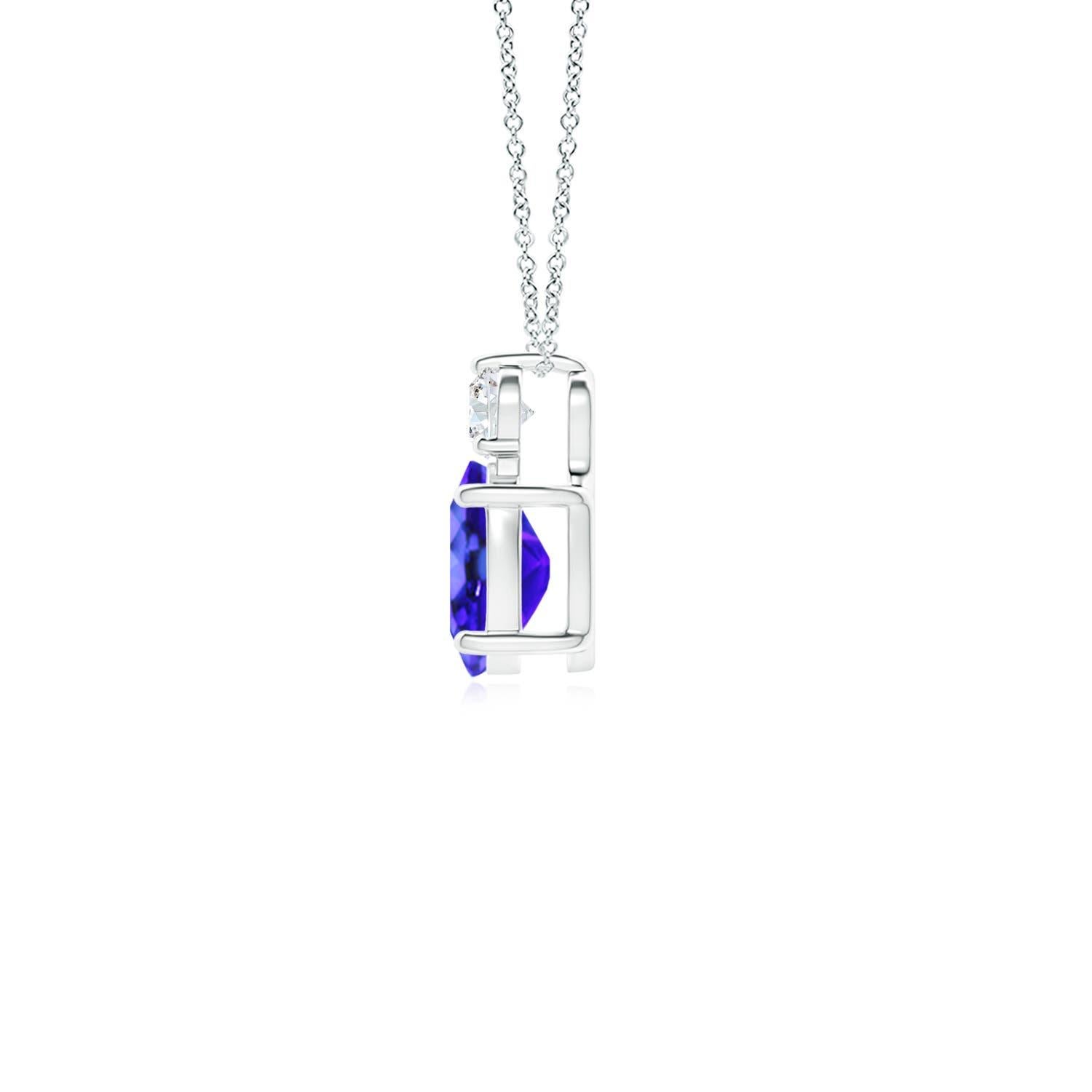 An oval tanzanite is topped with a glimmering round diamond, both held in prong settings. The alluring bluish-violet hue of the tanzanite is elevated by the diamond's unending sparkle. To add a dash of exquisiteness, this classic solitaire tanzanite
