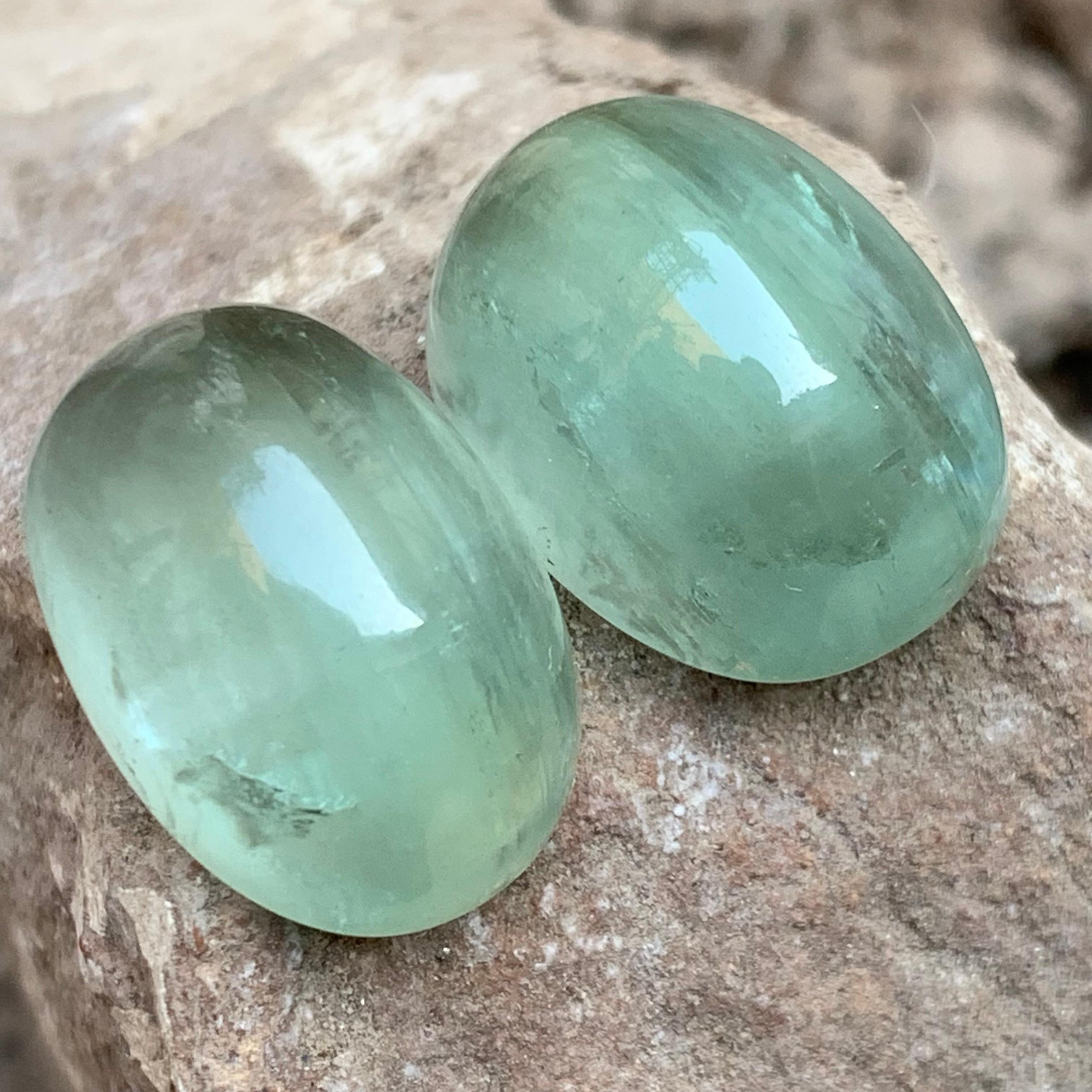 Pale Green Natural Beryl Loose Gemstones Pair Set Cabochon Cut with cat’s eye effect perfect for Earrings, Pendant, Bracelet or any other Jewelry Settings!!

💎 GEMSTONE TYPE: Beryl
⚖️ WEIGHT: 60.75 Carats
🪚 SHAPE & CUT: Cabochon Cut
📏 SIZE (MM):