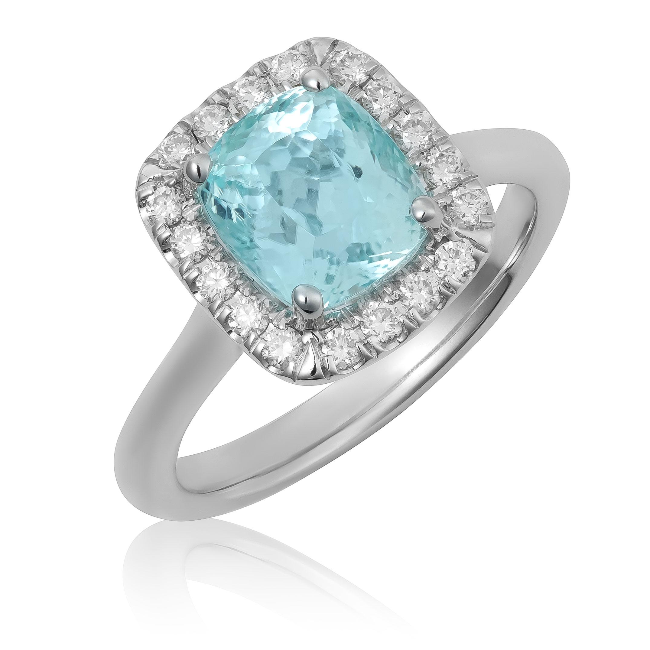 Introducing an exceptional 14K white gold ring featuring a rare natural Paraiba tourmaline weighing 2.73 carats. Cushion-shaped and measuring 7.99 x 7.13 x 6.59 mm, this gemstone radiates a mesmerizing green-blue hue, celebrated for its vivid glow.
