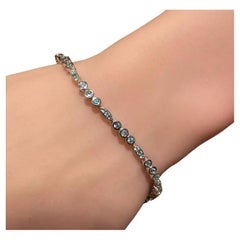 Tennisarmband aus 18 Karat Weißgold mit natürlichem Paraiba-Turmalin