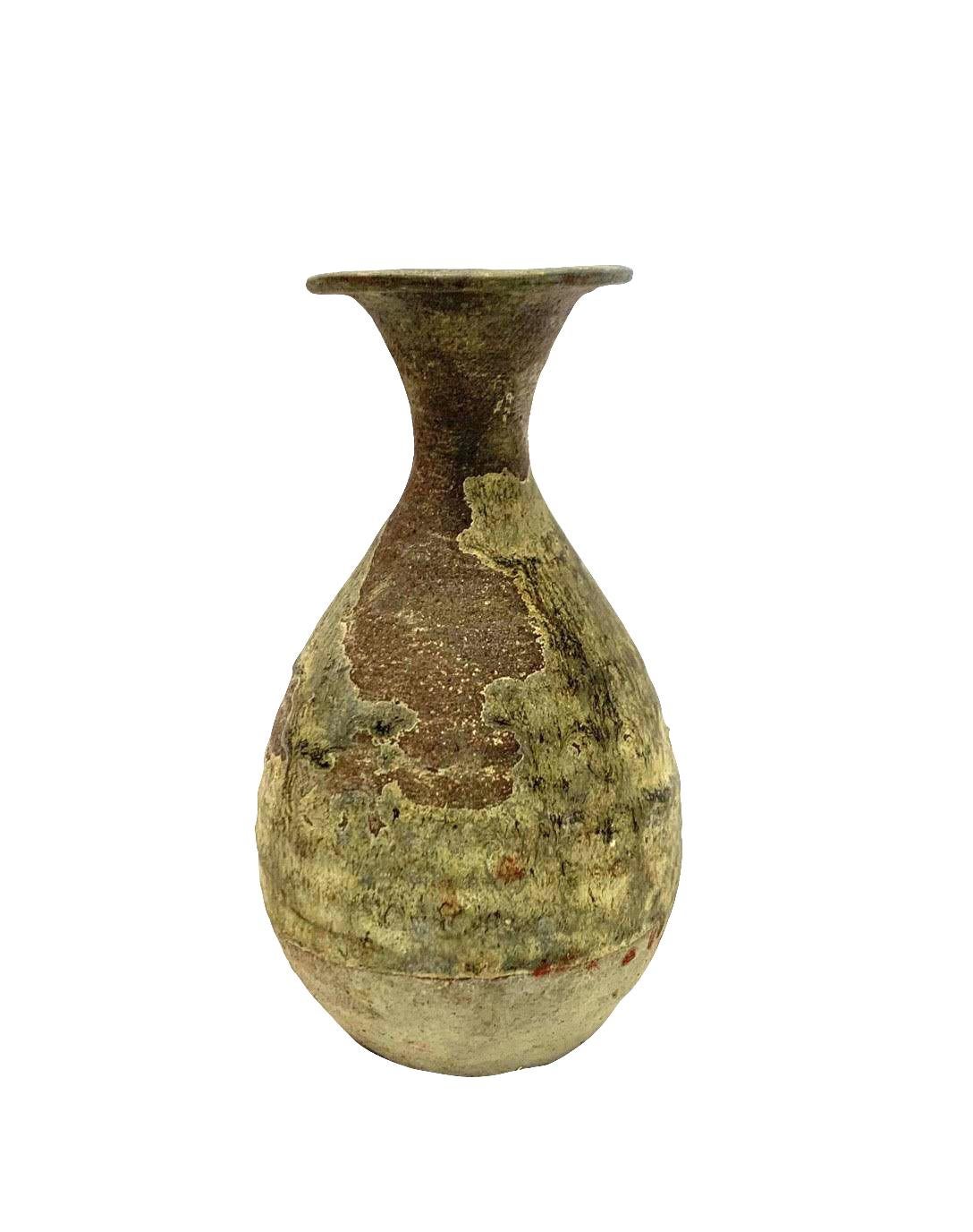 19th century Thailand ceramic vase originally used to store parfum.
Beautiful natural patina.
Three available with different finishes and sold individually.