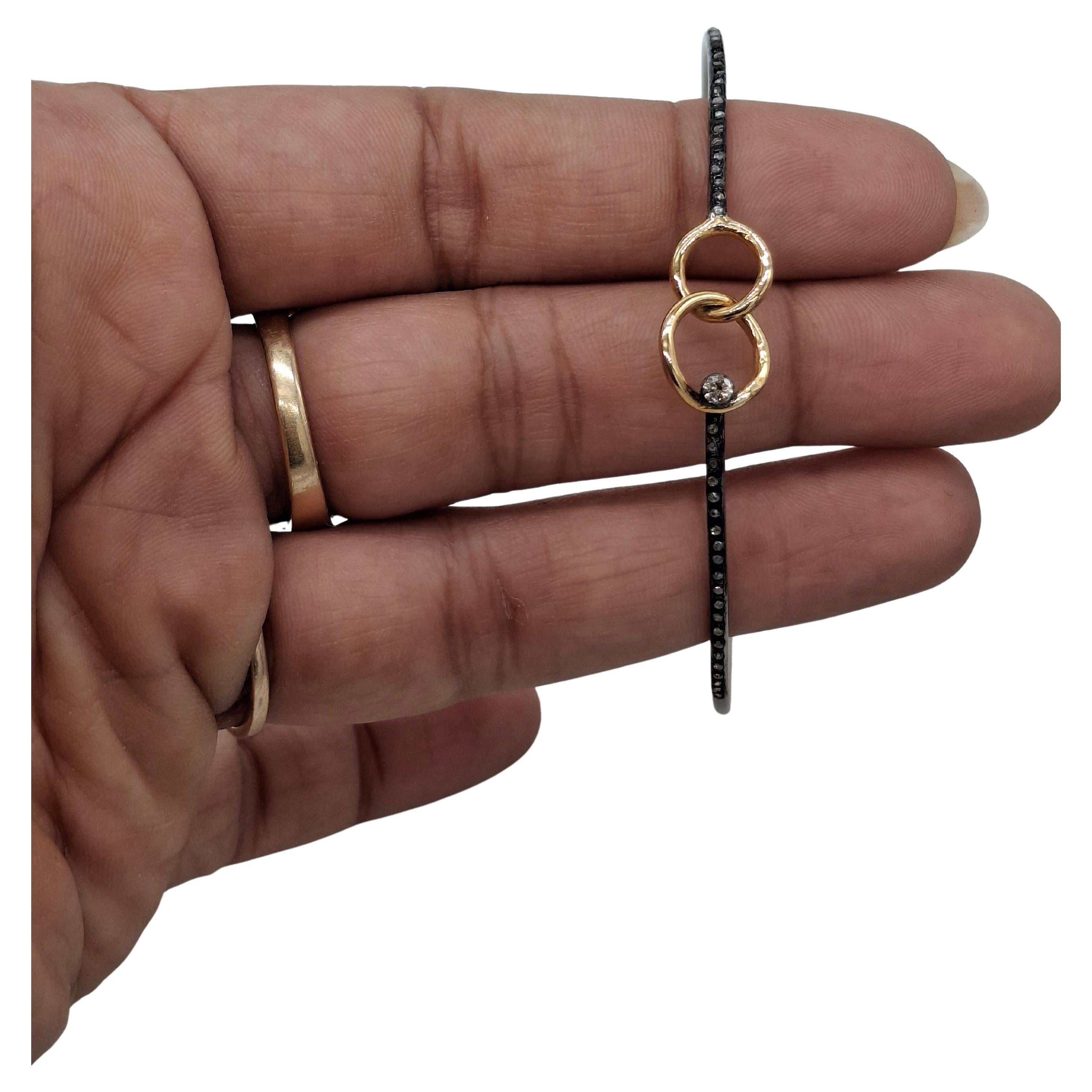 Bracciale elegante in argento ossidato con pavé di diamanti naturali di design