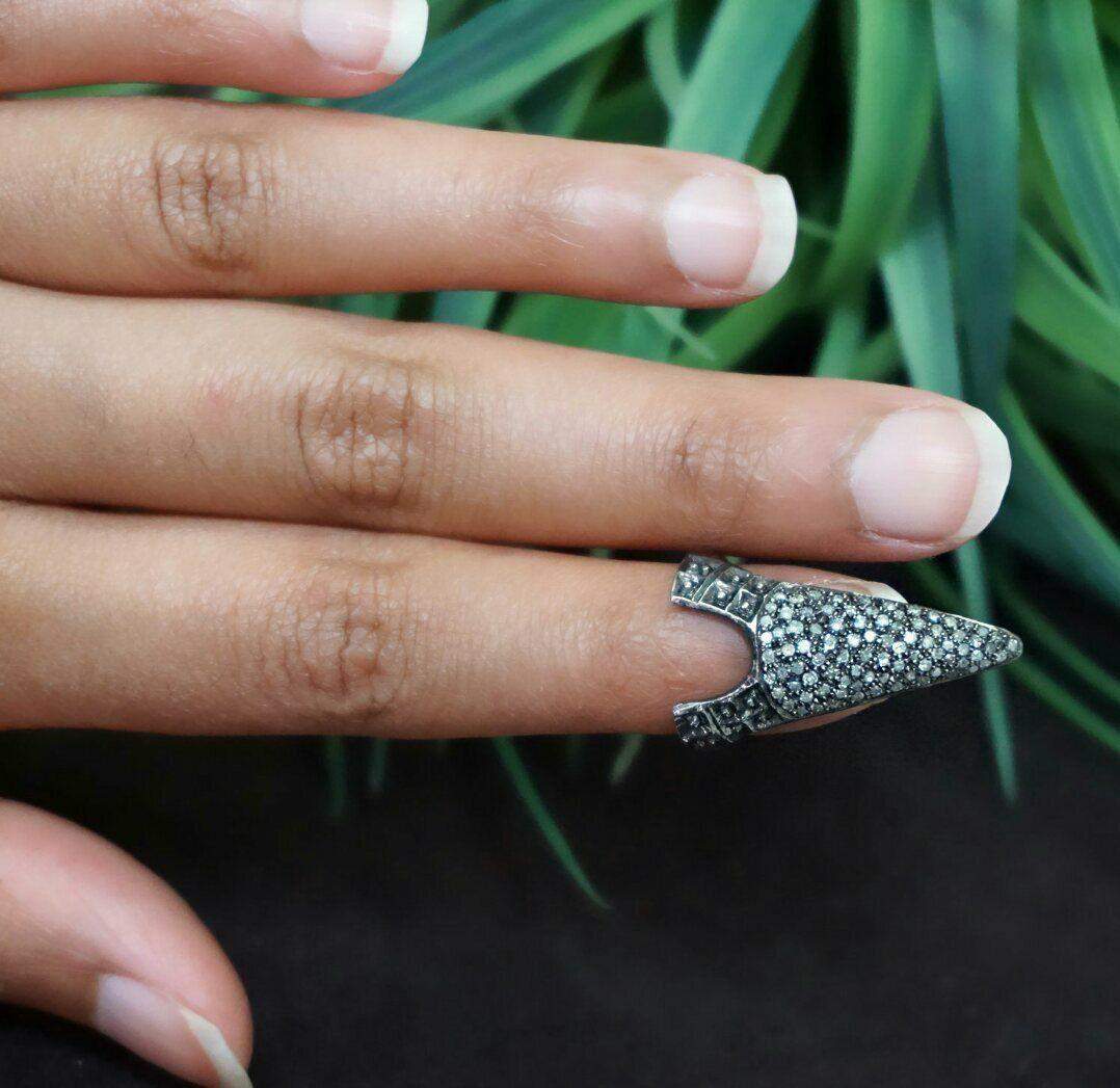 Natural Pave Diamond Nail Ring 925 Silver Diamond Handmade Nail Ring.

Style
Nail Ring
Base Metal
Sterling Silver, 925 parts per 1000
Secondary Stone
Diamond
Ring Shape
V-Shaped
Main Stone Treatment
Not Enhanced
Diamond Color
Fancy Color
Metal
