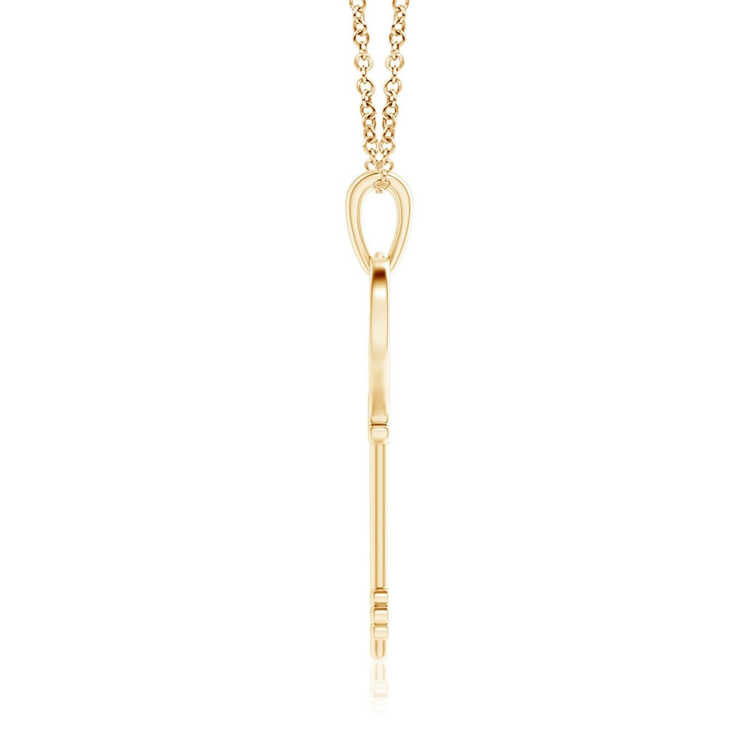 Cet adorable pendentif clé en forme de cœur est conçu avec une touche de romantisme. Les diamants, incrustés dans le cœur ouvert, éblouissent dans un sertissage pavé complexe. Magnifiquement réalisé en or jaune 14k, ce pendentif clé en diamant