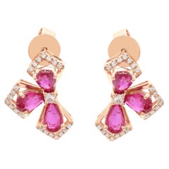 Clous d'oreilles en or rose 14 carats avec rubis naturel taille poire et diamants