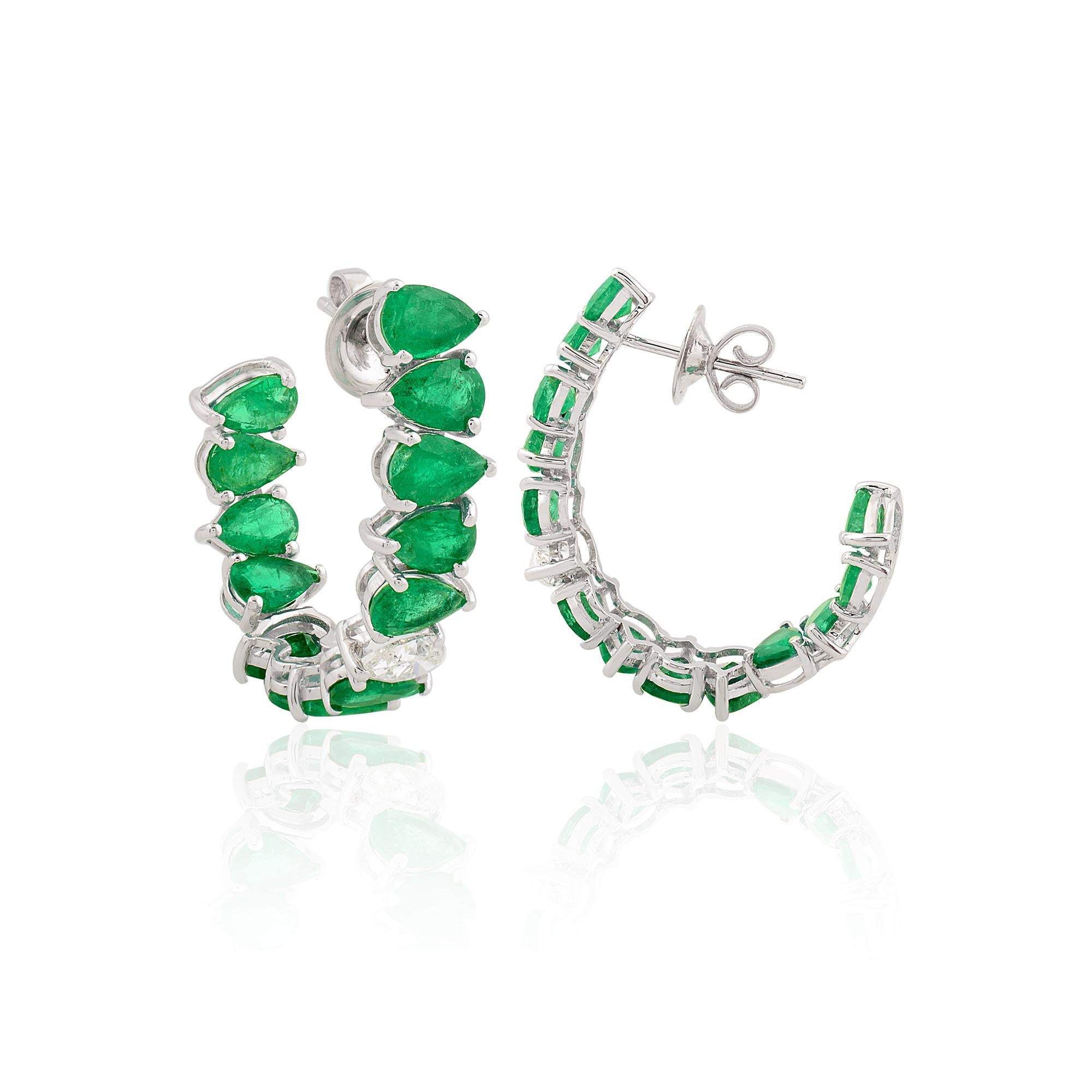 Item Code :- SEE-1639A (14k)
Gross Wt :- 6.74 gm 
14k Solid White Gold Wt :- 4.73 gm
Natural Diamond Wt :- 0.80 ct ( AVERAGE DIAMOND CLARITY SI1-SI2 & COLOR H-I )
Emerald Wt :- 9.24 ct
Earrings Size :- 32x20 mm approx.

✦