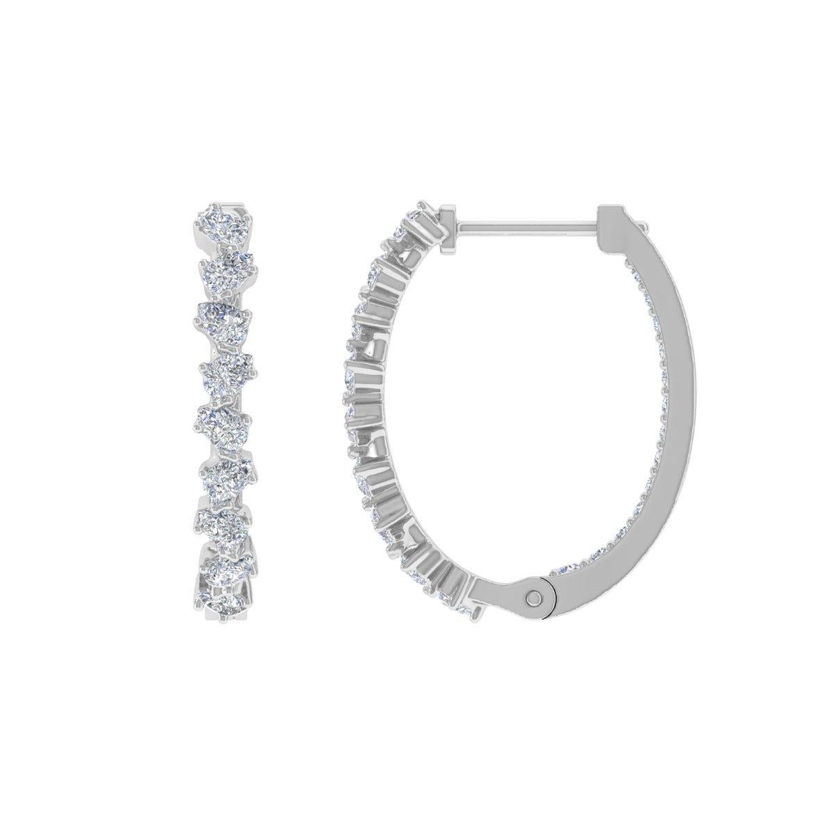 Indulge in the timeless elegance of these Natural Pear Round Diamond Hoop Earrings, meticulously handcrafted in radiant 14 Karat White Gold. This exquisite pair of handmade jewelry is a celebration of sophistication and grace, designed to adorn your