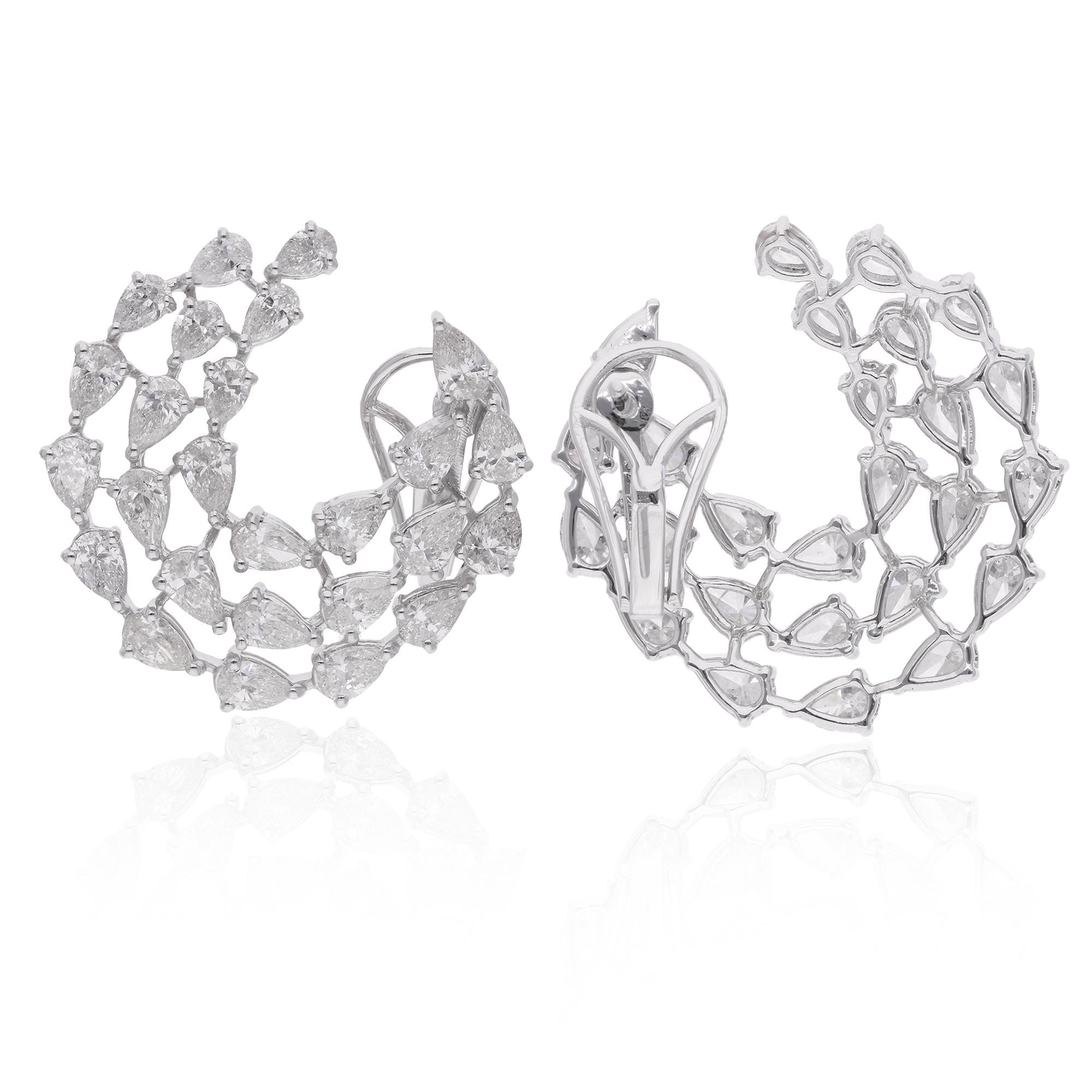 Crafted with precision and attention to detail, the earrings are fashioned in solid 18 Karat White Gold, adding a touch of luxury and refinement to the design. The white gold setting provides the perfect backdrop for the diamonds, enhancing their