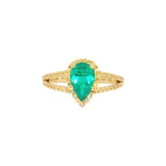 Natural Pear Shape Emerald with Yellow Diamonds in 18 Karat Yellow Gold