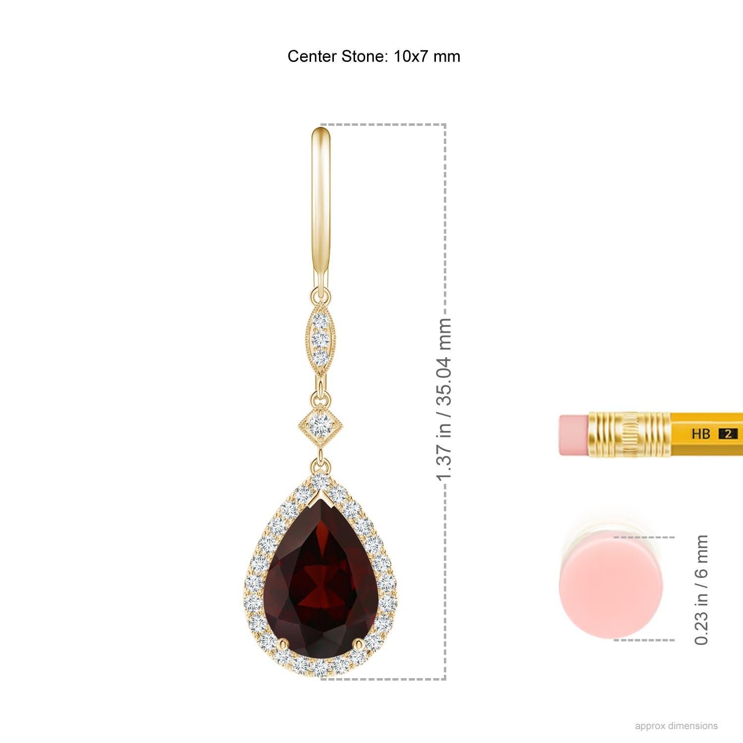 Dangling from shepherd hooks are these beautifully crafted garnet dangle earrings in 14K yellow gold. Pear-shaped garnets are illuminated by a halo of precious white diamonds that create a remarkable contrast. They are connected to station diamonds