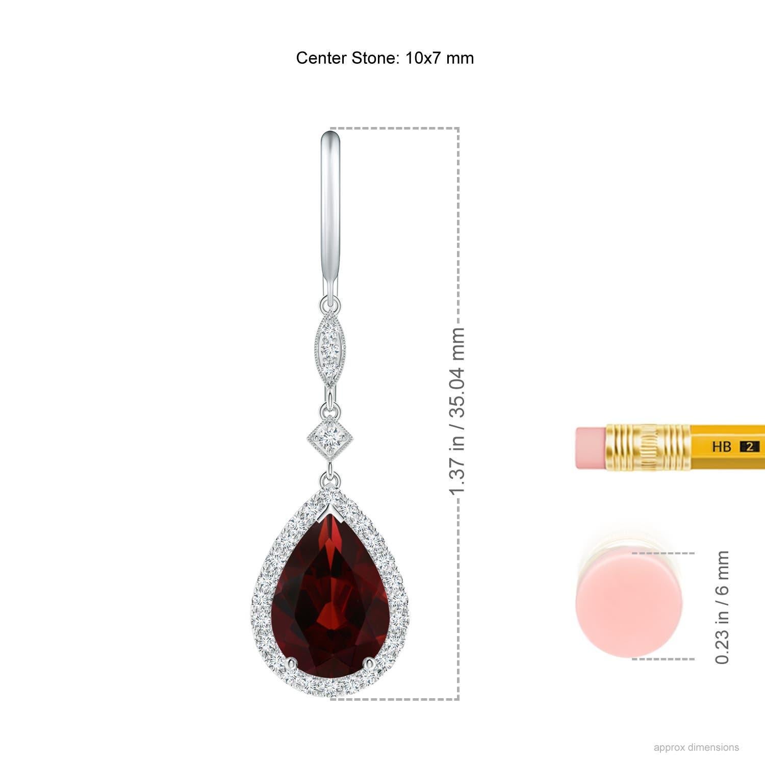 Dangling from shepherd hooks are these beautifully crafted garnet dangle earrings in platinum. Pear-shaped garnets are illuminated by a halo of precious white diamonds that create a remarkable contrast. They are connected to station diamonds nestled