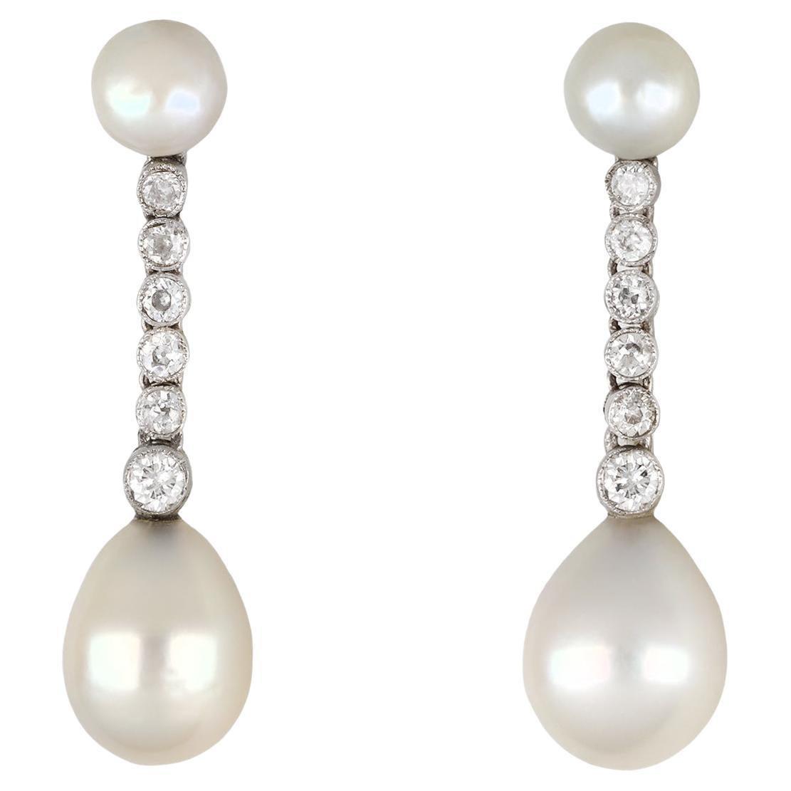 Natural pearl and diamond earrings, circa 1920.  For Sale