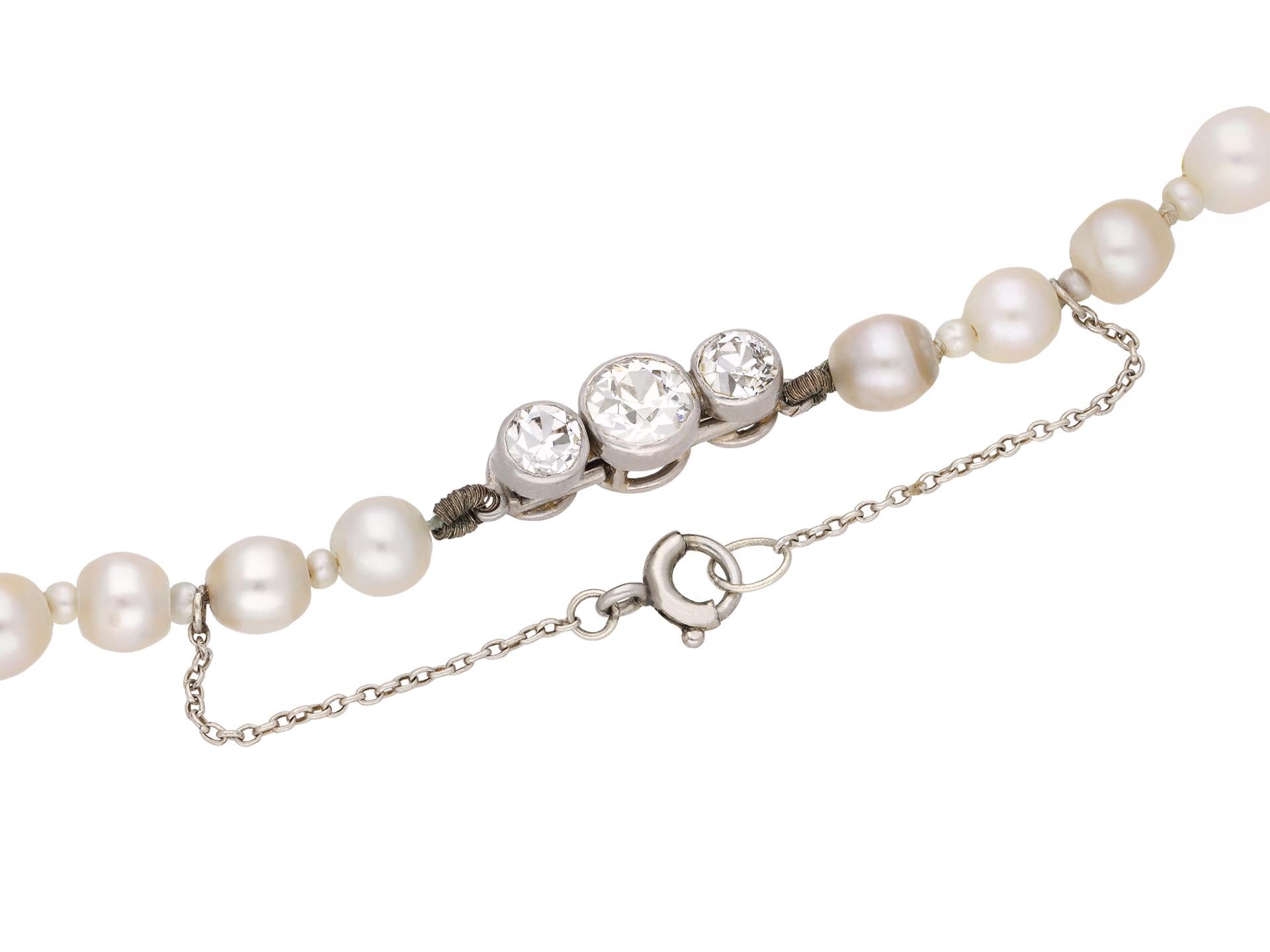 Natural pearl and diamond necklace. Set with one hundred and twenty one natural saltwater pearls, measurements ranging from approximately 1.6mm to 6.7mm, clasp set with three round old cut diamonds in open back rubover settings with an approximate