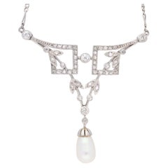 Natural pearl and diamond necklace, French, circa 1915.