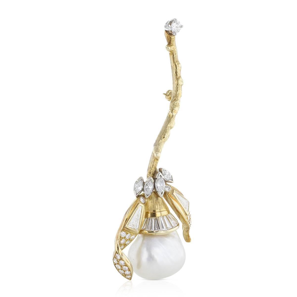 This bold and beautiful mid-20th-century vintage flower natural pearl brooch shimmers with large trilliant cut diamonds, marquise cuts and round brilliants encrusted and on its stem and petals all set in yellow gold. This breathtaking nature