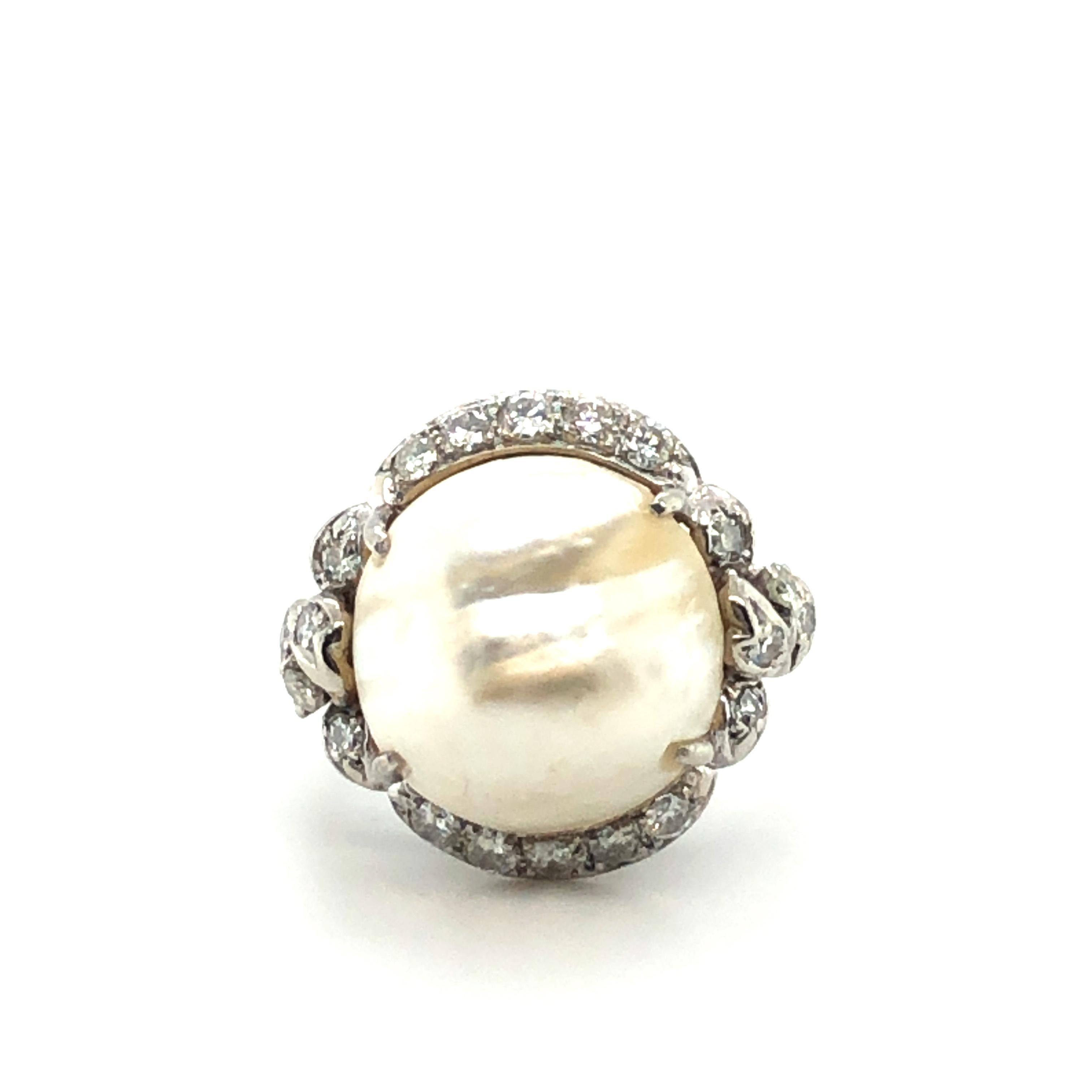 The 20 brilliant- and single-cut diamonds are totalling 0.50 ct and entwine around this beautiful natural blister pearl.
The pearl with a diameter from 13.5 - 13.8 mm / 0.53 - 0.54 inches has a particularly soft sheen like silver white silk.
The