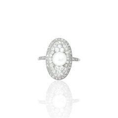 Anello con perle naturali e diamanti del 1900 circa