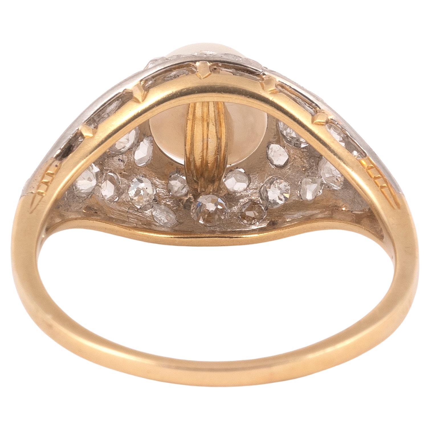

Of bombé design, centred with a single pearl within a pierced surround of old and single-cut diamonds, ring size 8 3/4
Weight:  4.45gr.

