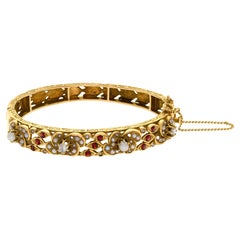 Natural Pearl, Diamond and Garnet Accents Bangle in 14k Yellow Gold