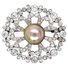Broche de diamantes y perlas naturales, GIA
