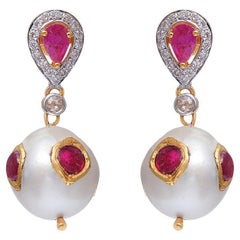 Orecchini con perle naturali in oro 18 carati