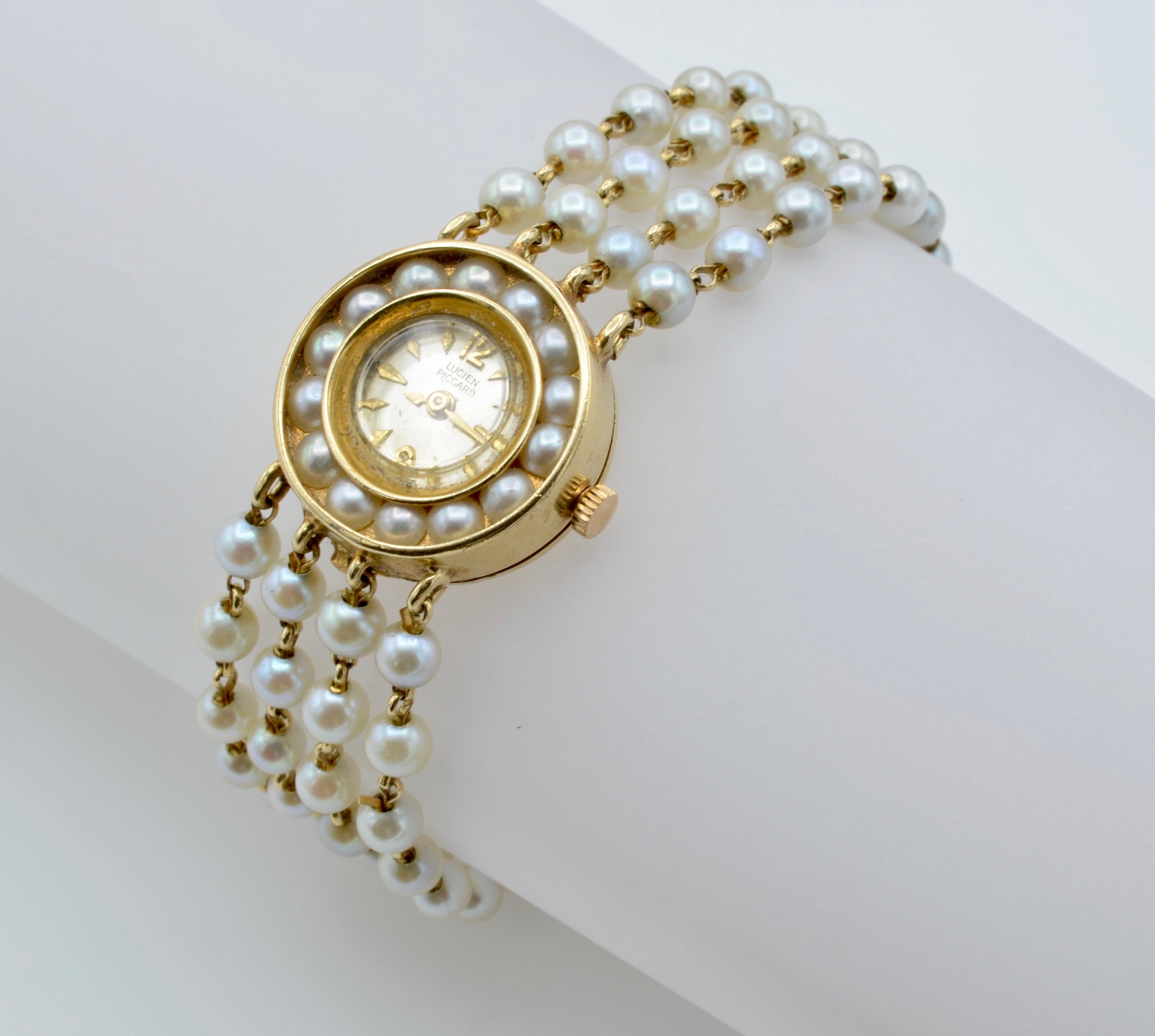 gold watch with pearls