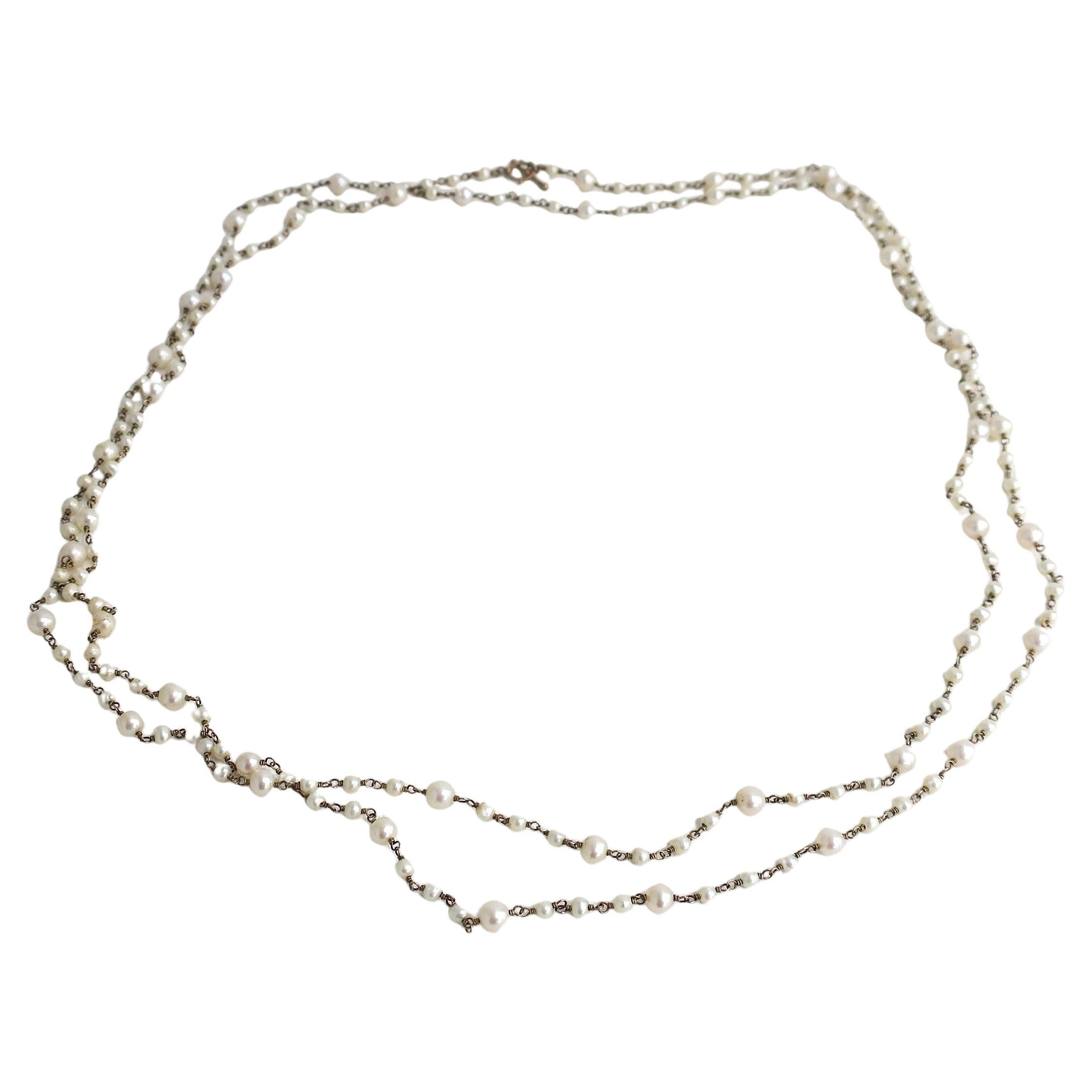 Collar de perlas al estilo de Chanel