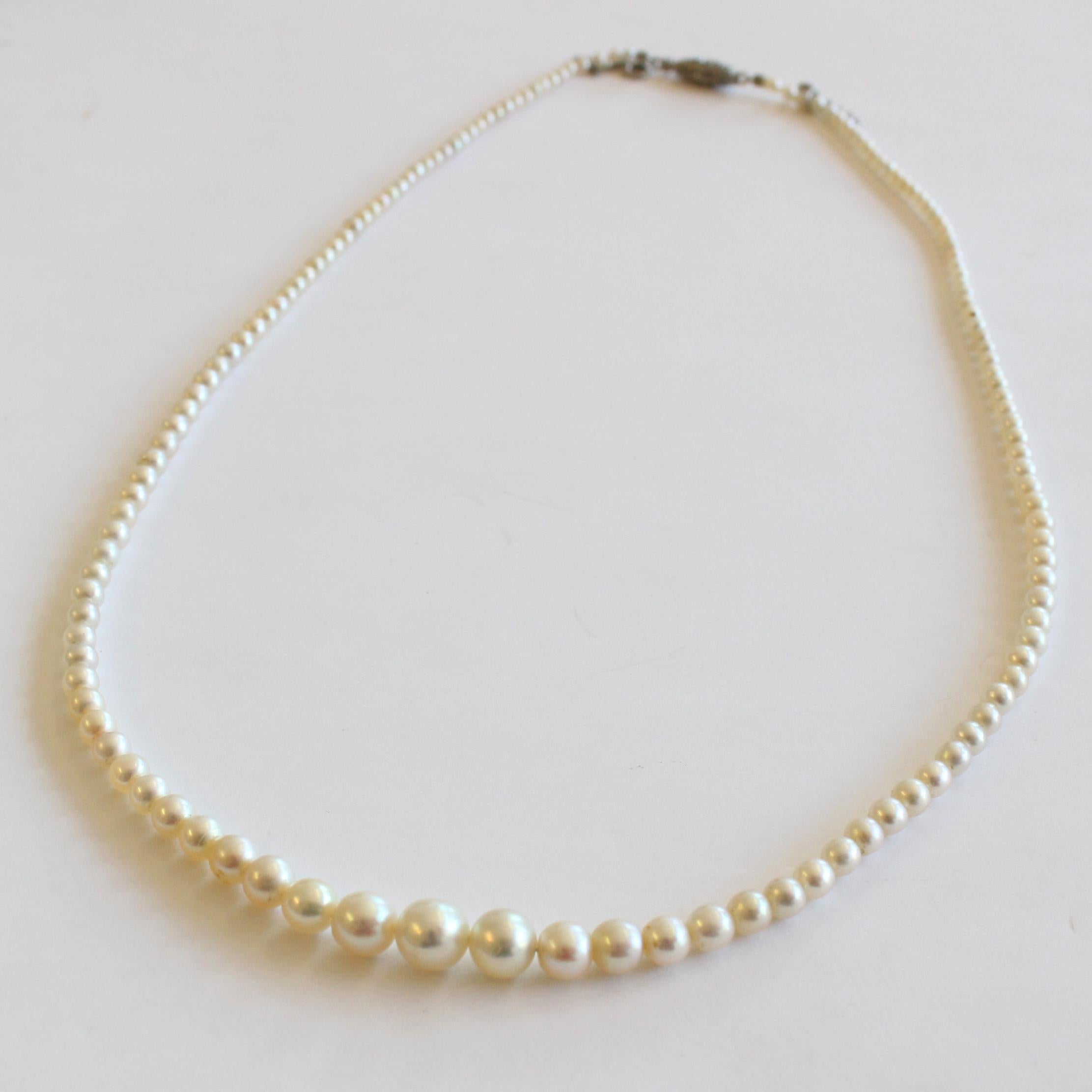 A Fine Antique Natural Saltwater Pearl Necklace, ca. 1900

The necklace has 141 natural saltwater pearls from 2.1mm to 6.7mm of the finest quality (lustre, shape, skin, overtones, colour) and is suspended with a diamond clasp set with 20 rose-cut