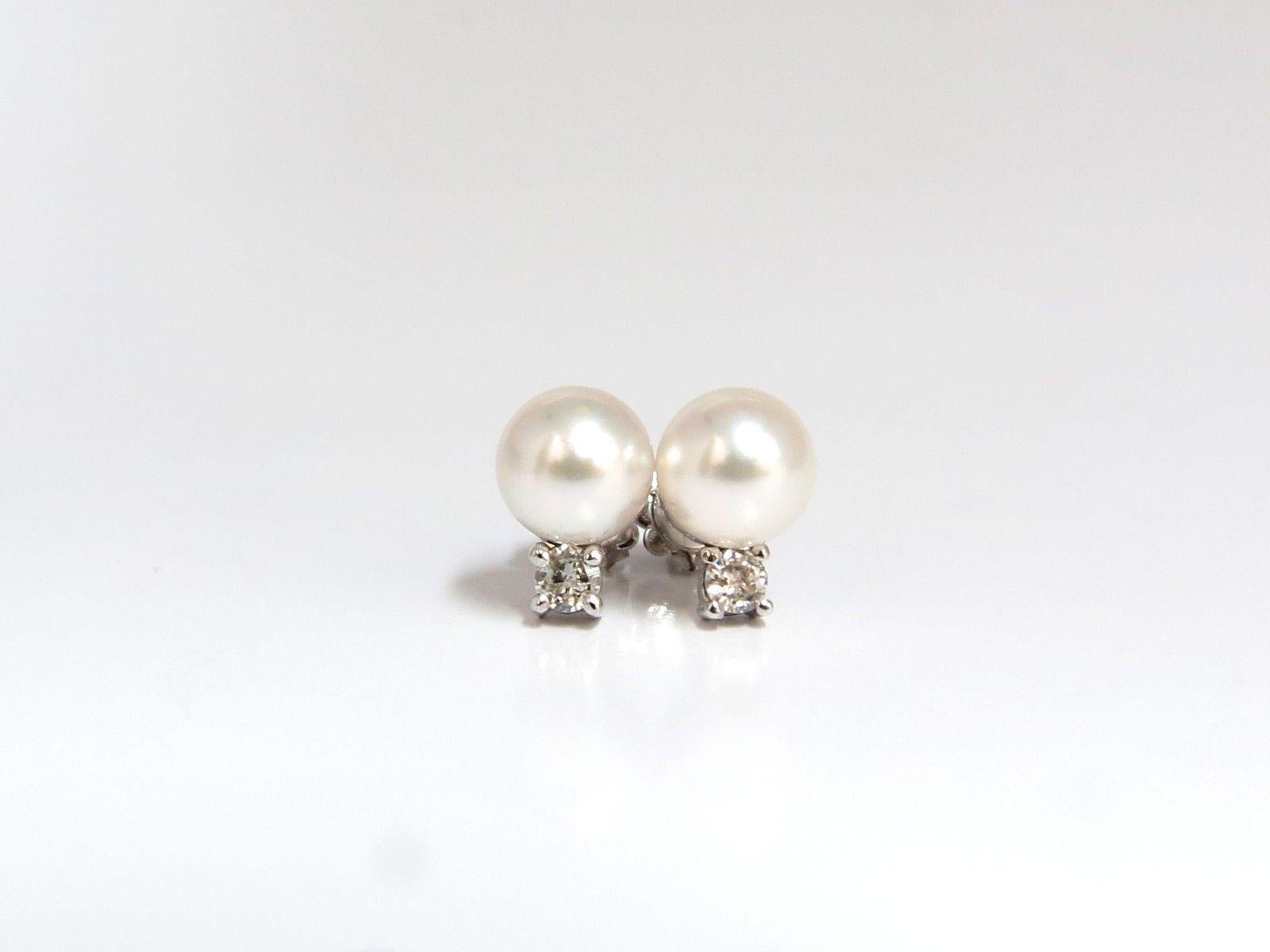 8.5mm natural South Seas White Pearls earrings

.28ct. Natural diamonds  

Round, Full cut brilliants.

G- color Vs-2 Clarity. 

Secure Butterfly

Excellent detail.

14kt. white gold

4.2 grams.

 .48 inch long

Comfortable pushbacks

$3000