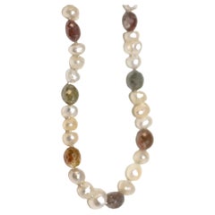 Hakimoto Natural Pearls from Bahrain and Natural Multi Color Diamonds