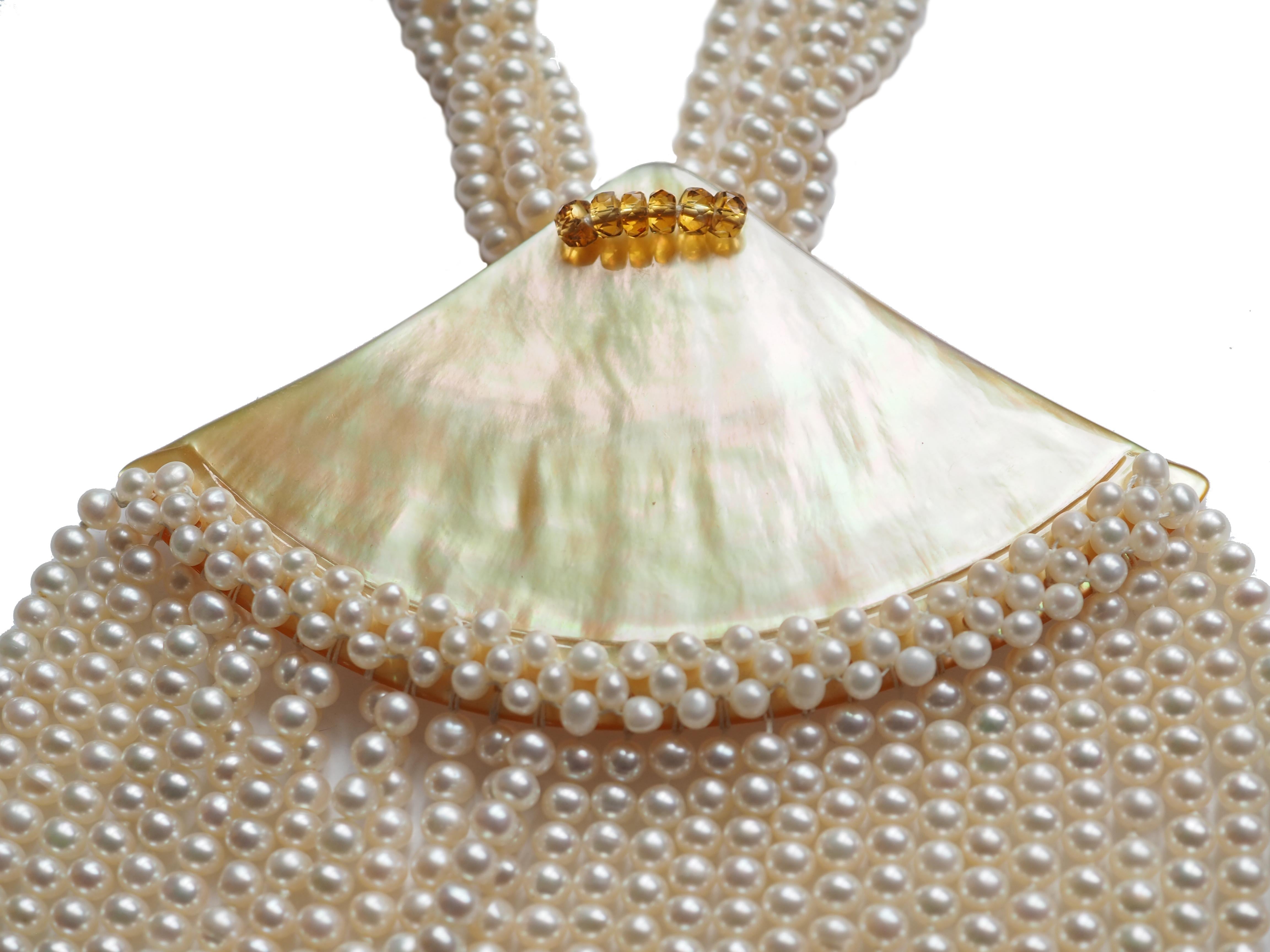 Natural  white Pearls  multi thread Necklace Mother of Pearls element  Citrine bronze.
All Giulia Colussi jewelry is new and has never been previously owned or worn. Each item will arrive at your door beautifully gift wrapped in our boxes, put