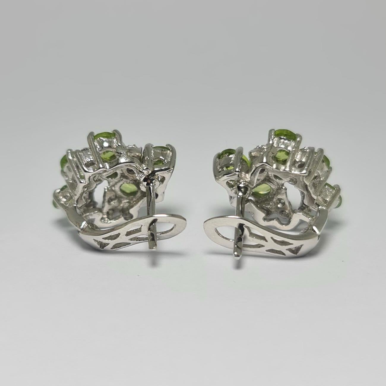 Art Nouveau Natural Peridot Cubic Zirconia .925 Sterling Silver Rhodium Plated Earring Pair For Sale