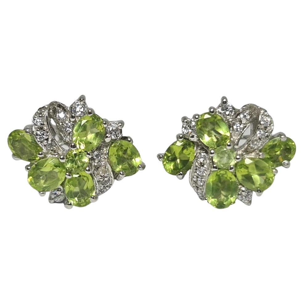 Natural Peridot Cubic Zirconia .925 Sterling Silver Rhodium Plated Earring Pair For Sale