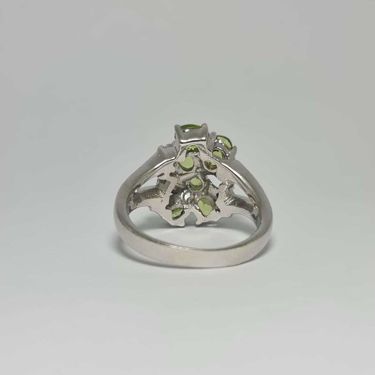Art Nouveau Natural Peridot Cubic Zirconia .925 Sterling Silver Rhodium Plated Ring For Sale