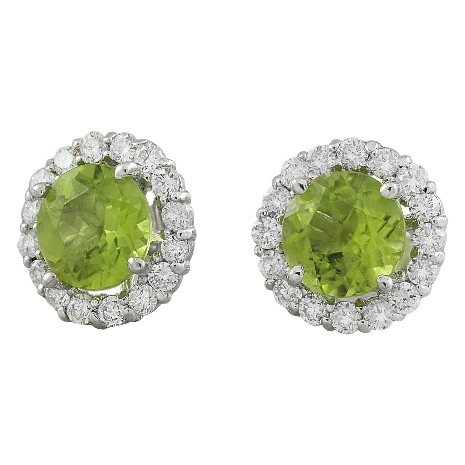 3.65 Carat Natural Peridot 14 Karat Solid White Gold Diamond Earrings
Stamped: 14K 
Total Earrings Weight: 1.5 Grams 
Garnet Weight: 3.00 Carat (7.00x7.00 Millimeters)  
Quantity: 2
Shape: Round
Treatment: Heating
Color: Green
Diamond Weight: 0.65