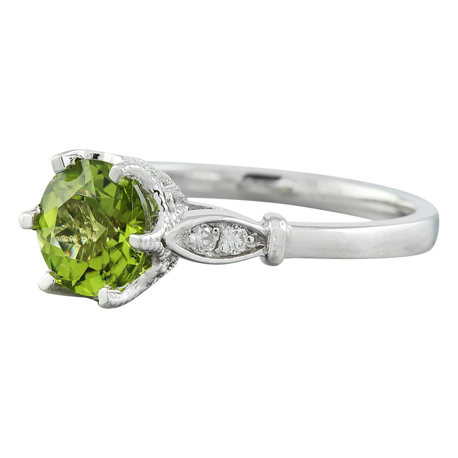 1.50 Carat Natural Peridot 14 Karat Solid White Gold Diamond Ring
Stamped: 14K 
Ring Size 7
Total Ring Weight: 3.4 Grams 
Peridot Weight 1.40 Carat (7.00x7.00 Millimeters)
Diamond Weight: 0.10 carat (F-G Color, VS2-SI1 Clarity)
Face Measures: