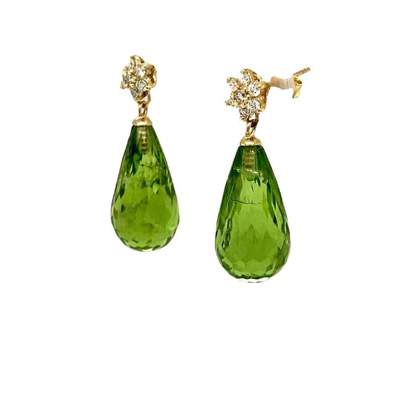 Natural Peridot Diamond Yellow Gold Drop Earrings

Item Specs:

2 Faceted Briolette Peridot stones weighing approximately 21.42 carats
(Measurements of Peridot Faceted Briolette 17mm x 9mm) 
14 Round Cut Diamonds weighing approximately 0.23