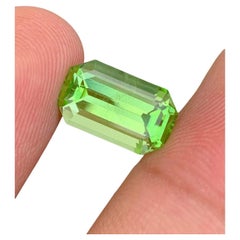 Natural Peridot Gemstone: 7.20 Carat Emerald Cut Peridot From Pakistan