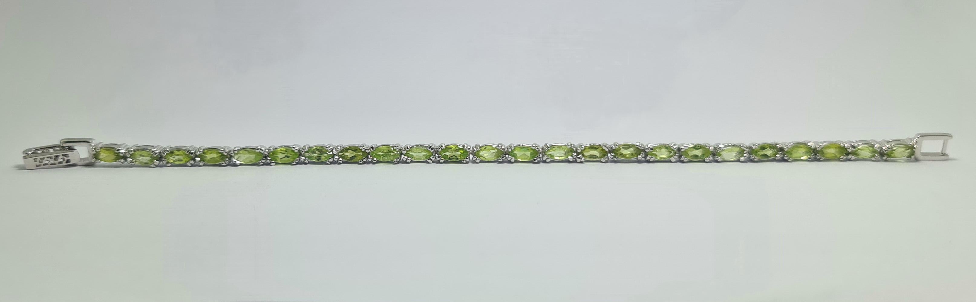 Modern Natural Peridot Marquise Cut Tennis Bracelet .925 Sterling Silver Rhodium Plated For Sale