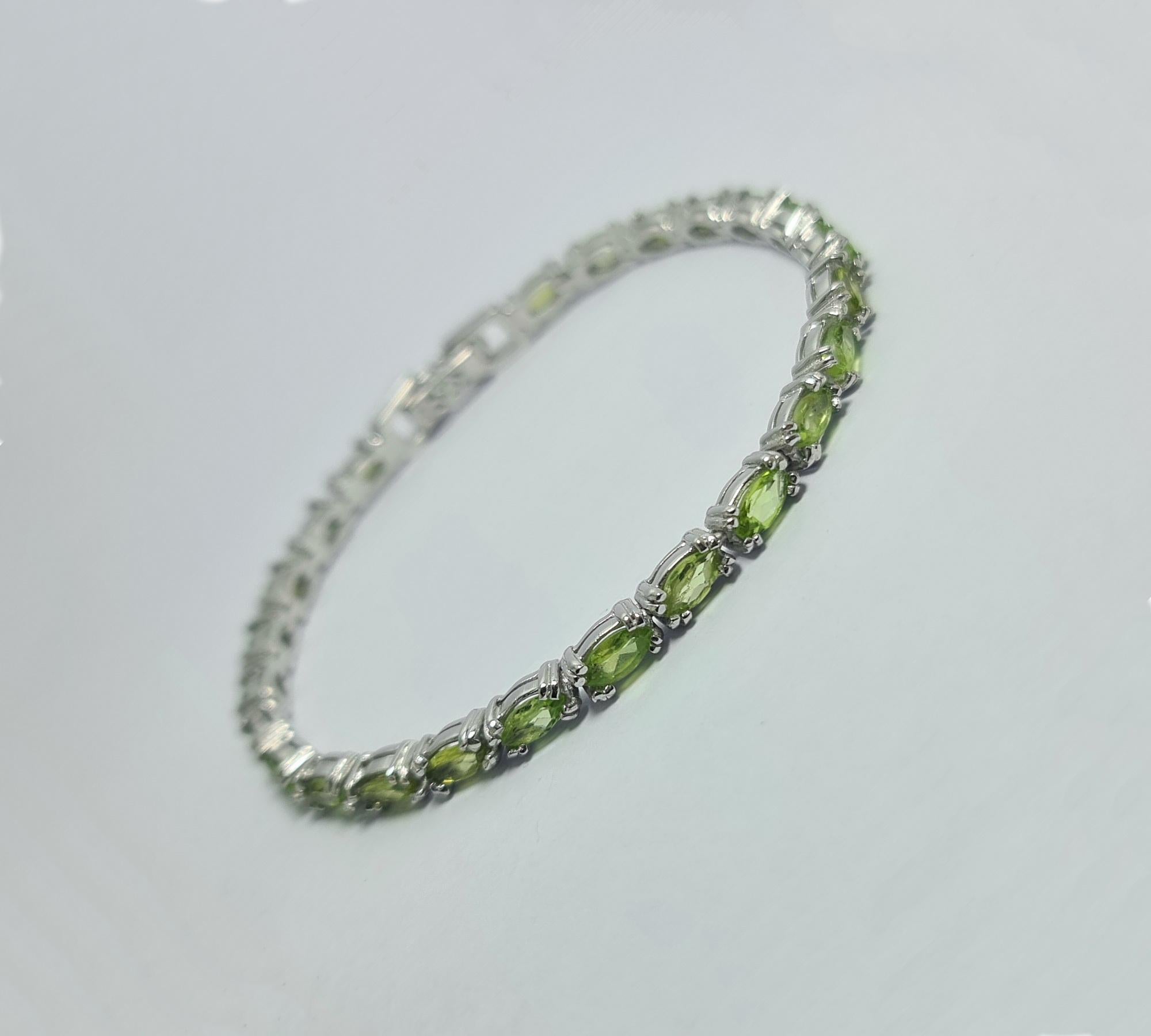 Natural Peridot Marquise Cut Tennis Bracelet .925 Sterling Silver Rhodium Plated In New Condition For Sale In Los Angeles, CA