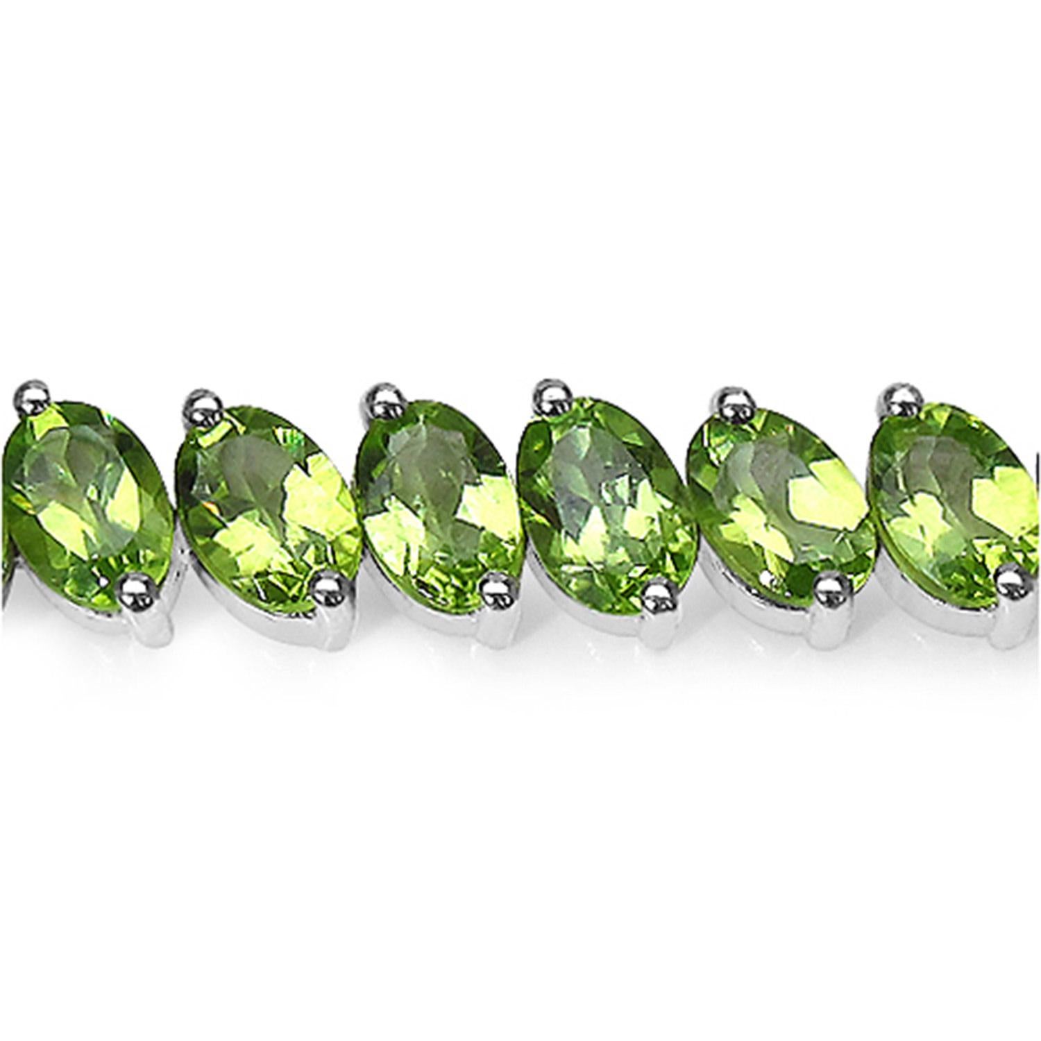 Contemporary Natural Peridot Tennis Bracelet Oval Cut 19.4 Carats 18K White Gold Plated For Sale