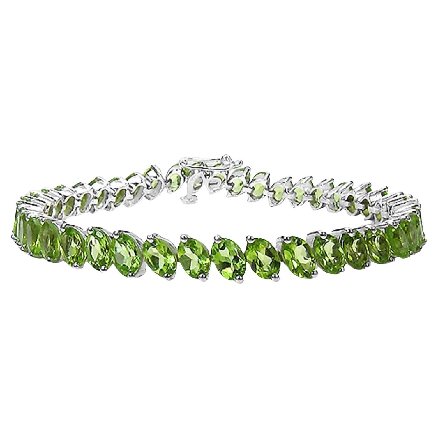 Bracelet tennis plaqué or blanc 18 carats avec péridot naturel taille ovale 19,4 carats