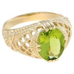 Filigraner Cocktailring aus 9 Karat Gelbgold mit natürlichem Peridot im Vintage-Stil