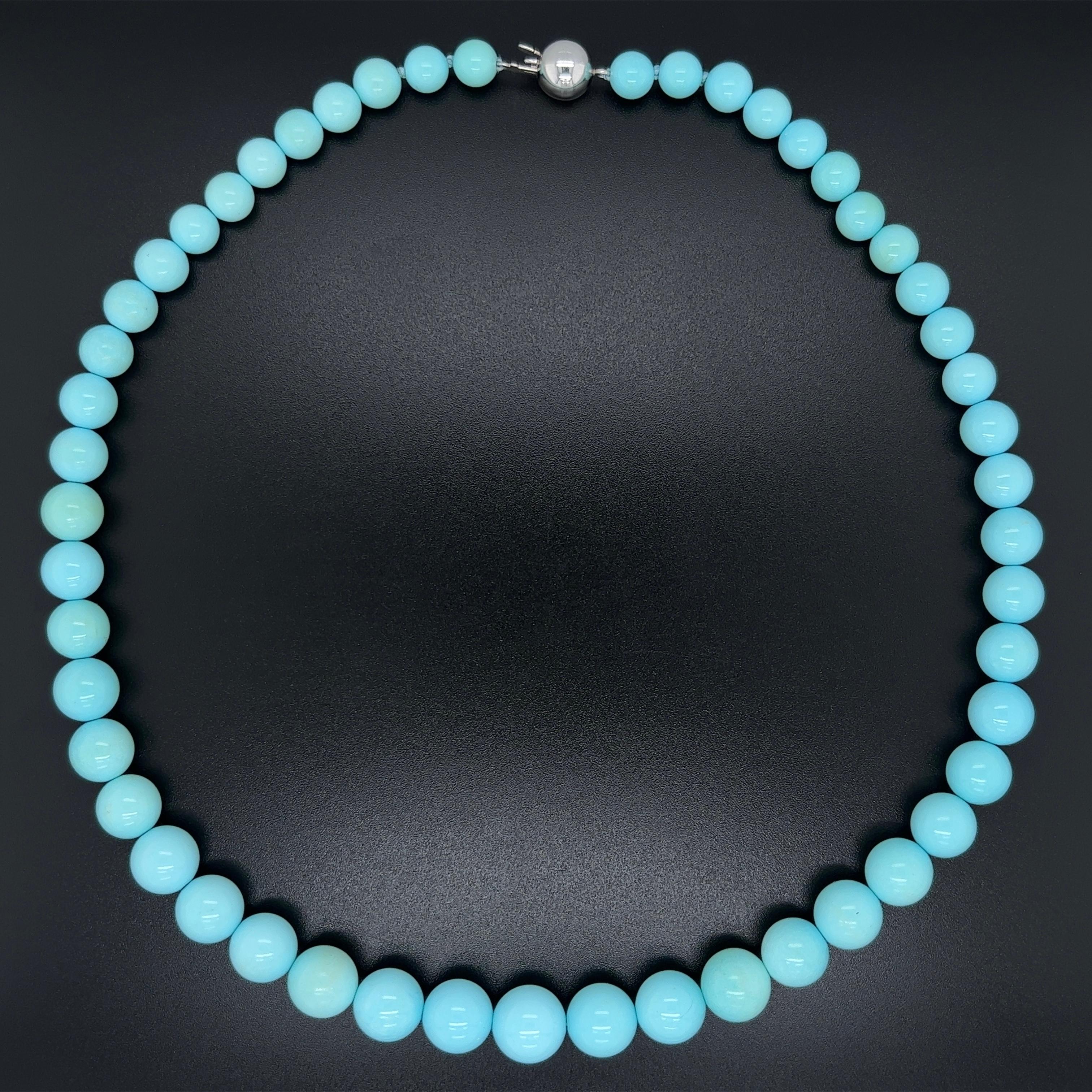 Simply Beautiful! 51 Round Persian Turquoise Beads Necklace. Each measuring approx. 6.15mm-10.10, held by a 18K White Gold clasp. The necklace measures approx. 16” long. More Beautiful in real time! Classic and Chic...A sure to be admired piece