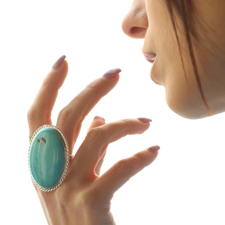 Magnificent Persian turquoise ring with an exceptional art work, outstanding display of color and Italian craftsmanship designed by Intini Jewels. The turquoise is the birthstone for December and is valued as a mystical stone that had protective and