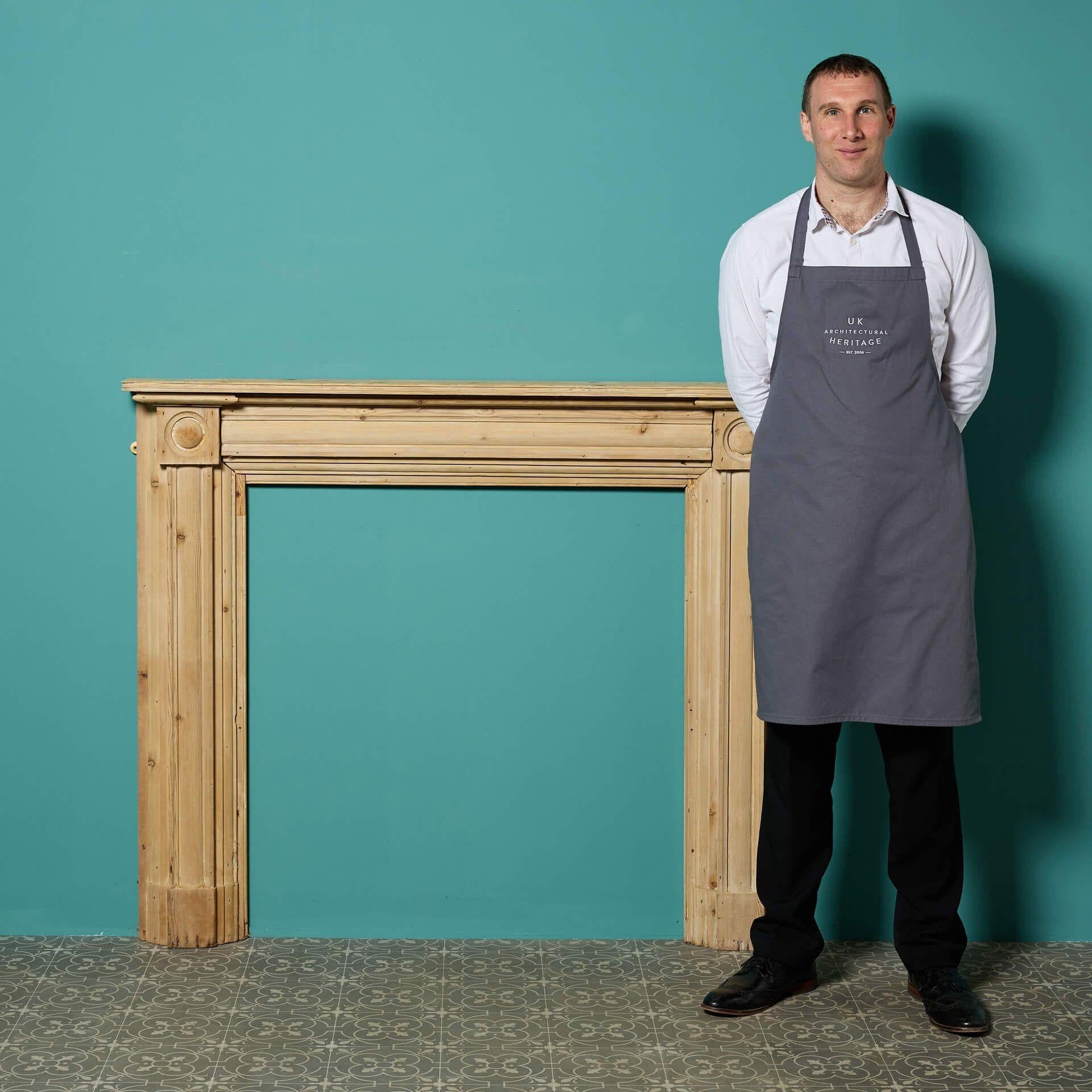 An antique natural pine Georgian bullseye fireplace.

Though the design is simple, this antique pine surround speaks volumes in an interior, ornamented with round details called ‘bullseye’ on each end block alongside a moulded frieze and