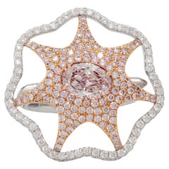 Anillo de cóctel con diseño de estrella de mar de diamantes rosas y blancos naturales en oro de 18k